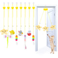 Cat playing with door-hung retractable teaser