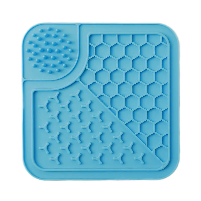 Dog lick mat slow feeder in blue, showing the honeycomb, nub and ridge sections
