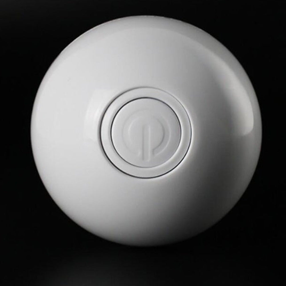 Self-Rolling LED Laser Cat Ball — close-up of the recessed USB power button