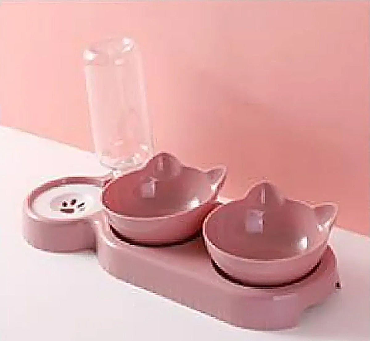 Tilted double cat bowl in haze blue, side view