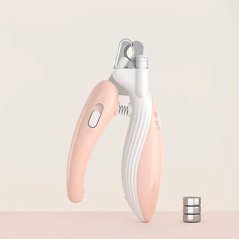 LED pet nail clipper in pink with flip-up light guard
