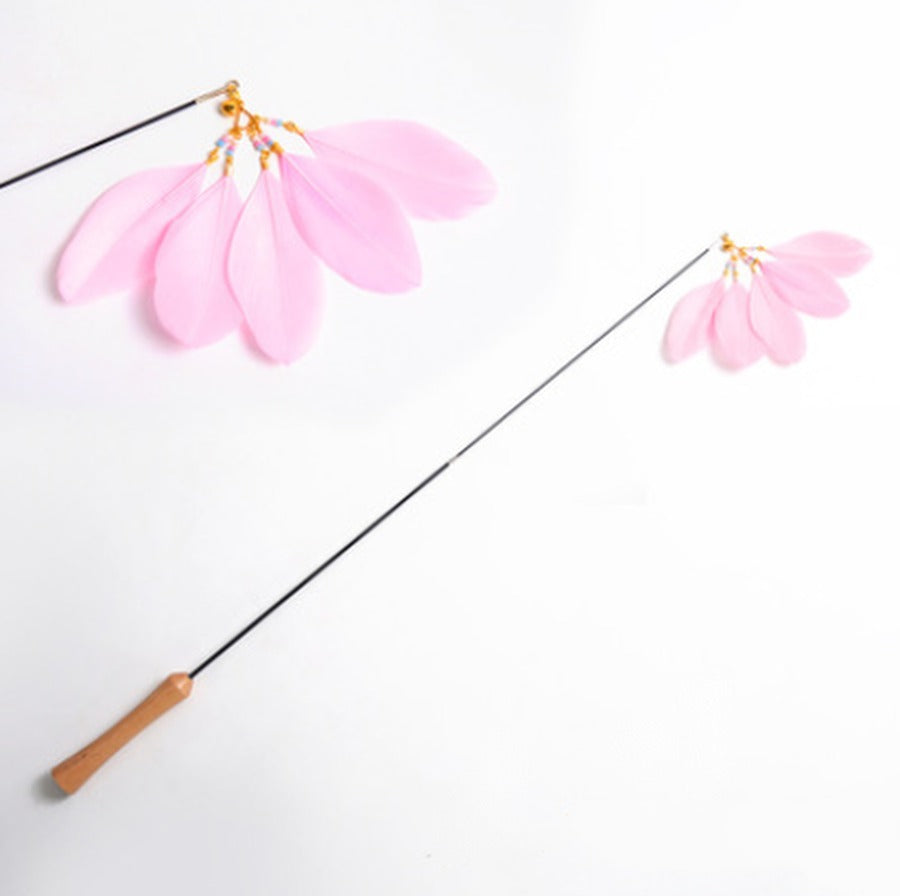 Retractable wooden cat teaser wand with pink feathers