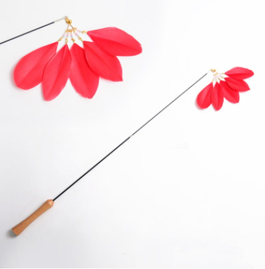 Retractable wooden cat teaser wand with red feathers